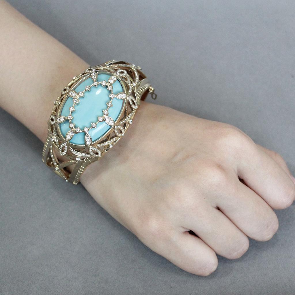 LO4348 - Gold Brass Bangle with Synthetic in Sea Blue-4
